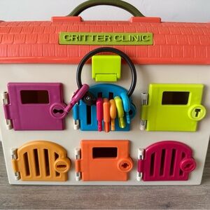 Critter Clinic Busy Board Playset with Colorful Keys - Multicolor
